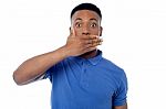 Surprised Young Man Looking At Camera Stock Photo