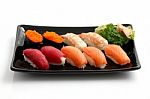 Sushi On Black Dish Stock Photo