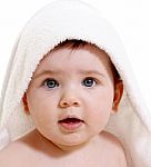 Sweet Baby Face Under Towel Stock Photo