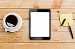 Tablet White Display And Coffee On Wood Workspace Stock Photo