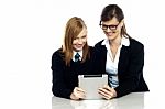 Teacher And Student Busy In Tablet Device Stock Photo