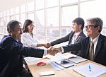 Team Of Man And Woman  Business People Successful Shaking Hand After Solution Meeting Agreement Shot In Office Room Stock Photo