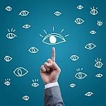 Teamwork Eye Vision Concept With Business Hand Stock Photo