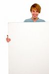 Teenage Boy Holding Blank Board Stock Photo