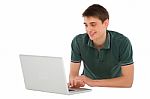 Teenage Boy Working With Laptop Stock Photo