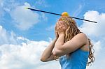 Teenage Girl Feeling Fear With Apple And Arrow On Head Stock Photo