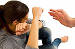 Teenage Girl Hand To Block Violence Stock Photo