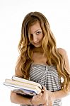 Teenage Girl Holding Books Stock Photo