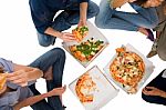 Teenagers Eating Pizza Stock Photo