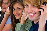 Teenagers Talking Over Phone Stock Photo