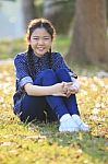 Thai 12s Years Girl Sitting On Garden Field Toothy Smiling Face Happiness Emotion Stock Photo