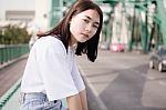 Thai Adult Girl White T-shirt Beautiful Girl Relax And Smile Stock Photo