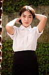 Thai Adult Student University Uniform Beautiful Girl Relax And Smile Stock Photo