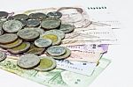Thai Bank Note And Coins Stock Photo