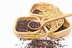 Thai Black Jasmine Rice (rice Berry) In Wooden Bowl Stock Photo