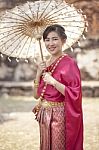 Thai Woman Wearing Period Tradition Clothes Style Toothy Smiling Face In Ayutthaya Heritage Place Stock Photo