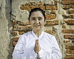 Thai Woman With Typical Welcome Expression Stock Photo