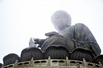 The Enormous Tian Tan Buddha Statue At High Mountain Near Po Lin Monastery, Lantau Island, Hong Kong Stock Photo