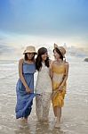 Three Asian Younger Woman Relaxing Happiness Emotion On Vacation Beach Stock Photo