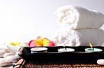 Three Candles In Ceramic Bowl Stock Photo