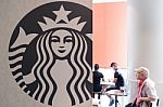 Tokyo - Apr 18: Starbucks Logo In Shibuya. It Is A Coffee Cafe O Stock Photo