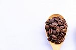 Top View Close Up Coffee Bean On Wooden Spoon Stock Photo