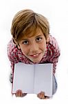 Top View Of Boy Showing Book Stock Photo