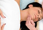 Top View Of Female Taking Face Massage On An Isolated Background Stock Photo