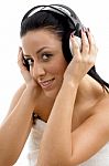 Top View Of Smiling Female Wearing Headphone Stock Photo