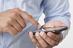 Touching A Smart Phone Stock Photo