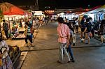 Tourists Walk To Shop At Night Market Srinakarin Road Or Train Market, Thailand Stock Photo