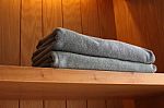Towel On Wooden Shelf Stock Photo