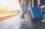 Traveler Girl With A Luggage Waiting For Train On The Station. O Stock Photo