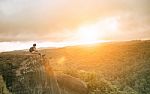 Traveling Woman Relaxing Trekking On Rock Cliff Use For People Leisure Lifestyle Stock Photo