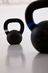 Two Black Iron Kettlebell For Weightlifting And Fitness Stock Photo