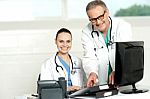 Two Cheerful Doctors At Hospital Stock Photo
