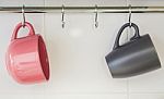 Two Hanging Mugs Stock Photo