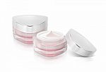 Two Pink Triangle Cosmetic Jar On White Background Stock Photo
