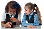 Two Pretty School Girls With Microscope Stock Photo