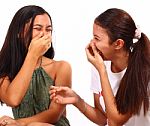 Two Teenager Girls Laughing And Giggling Stock Photo