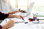 Two Young Women Working As Fashion Designers And Drawing Sketche Stock Photo