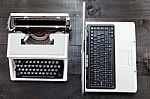 Typewriter And Computer Laptop On Wooden Background Retro Stock Photo