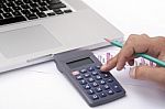 Typing On The Calculator Stock Photo