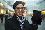 Urban Man Holdin Tablet Computer On Street Stock Photo