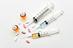 Vaccine / Hypodermic Syringe / Needle / Pills Stock Photo