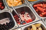 Various Fresh Fruit And Vegetable Salad Bar Healthy Items Stock Photo