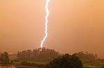 Vertical Lightning At Sunset Stock Photo