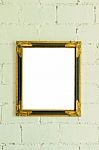Vintage Gold Picture Frame On White Wall Stock Photo