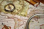 Vintage Map And Vintage Compass With Magnifying Glass At The Corner Stock Photo