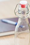 Vintage Water Bottle On Wooden Background Stock Photo